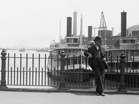 Guy standing in front of ship