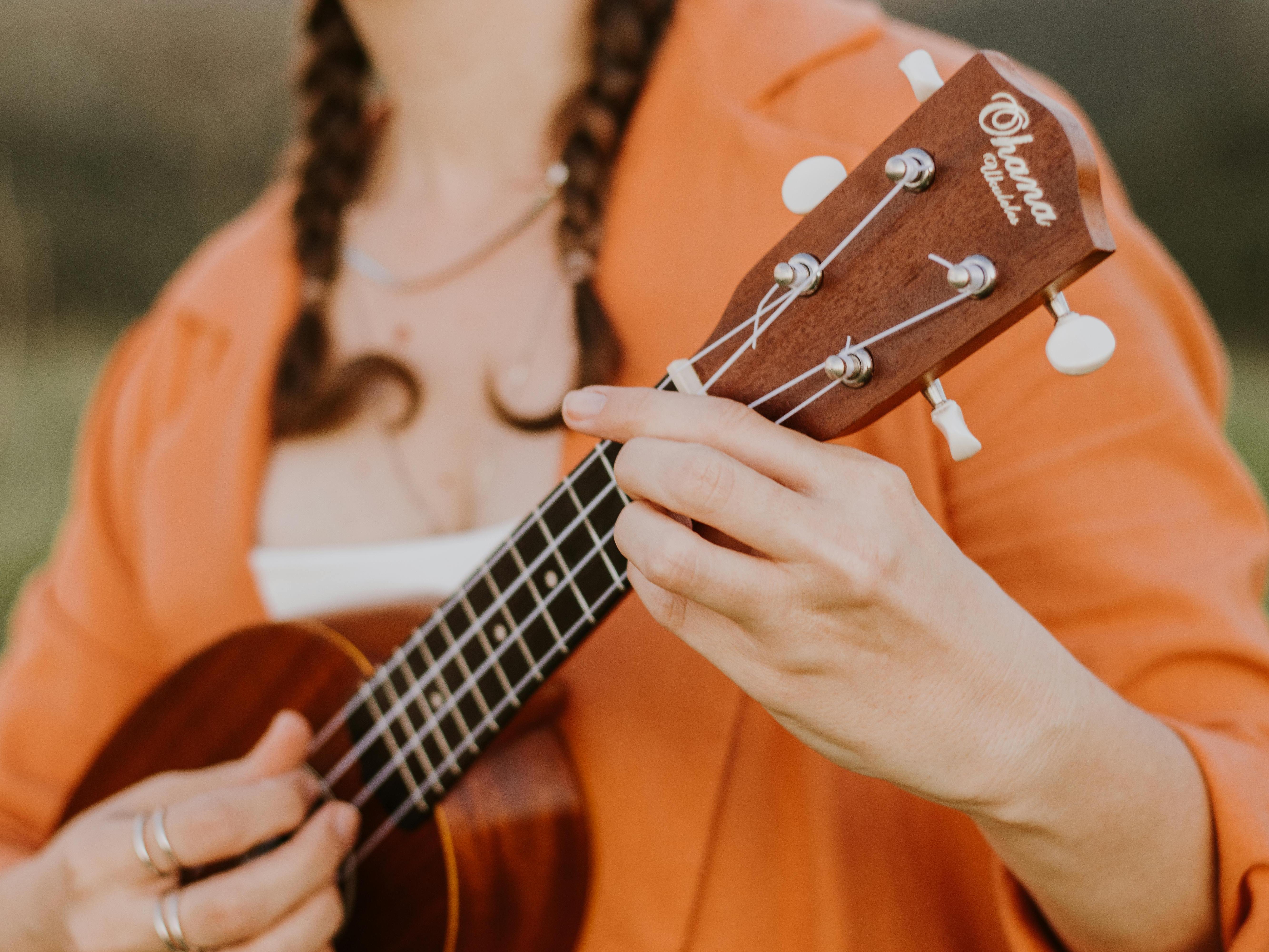 A Woman Playing Ukulele