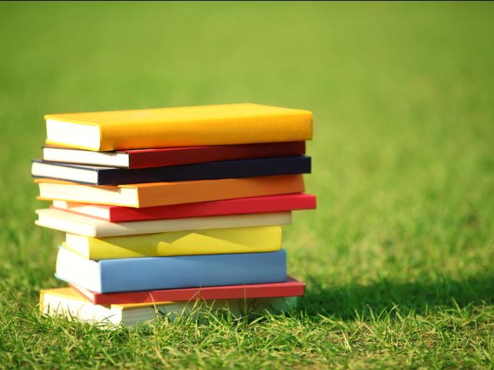 books in the grass
